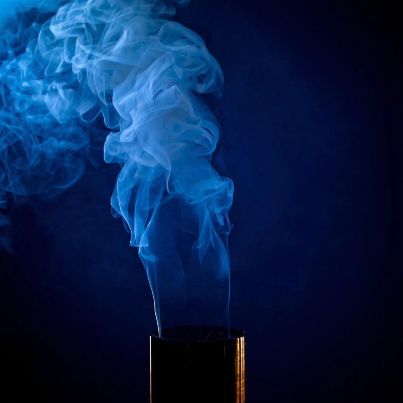 Controlled blue vapour released from a small deployment vessel.